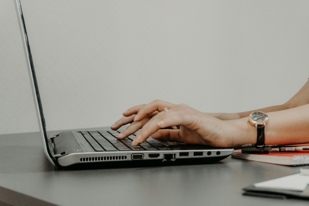 hands typing keyboard