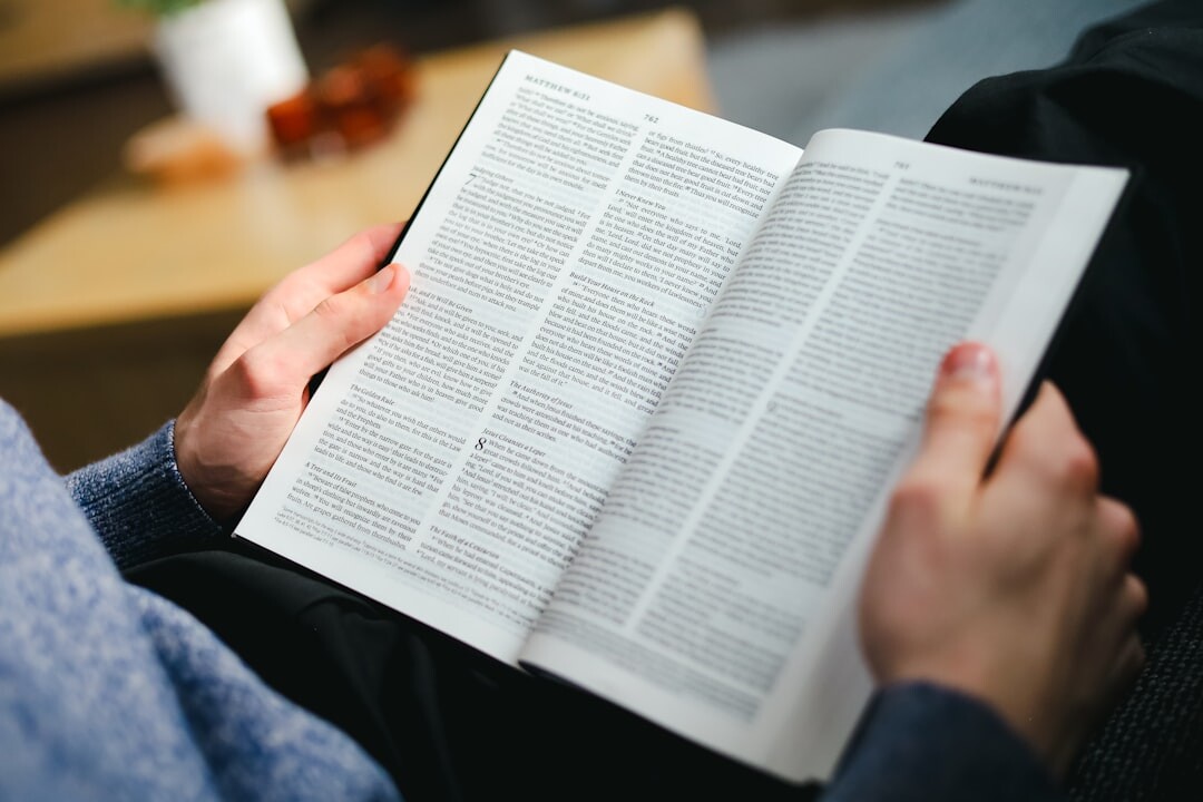 person reading on couch